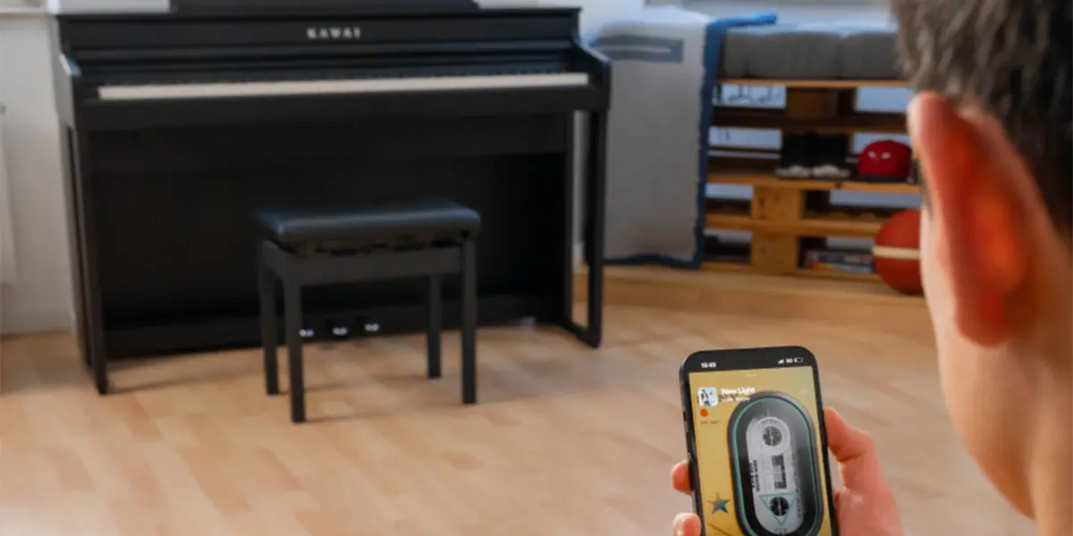 Kawai CA 401 digital piano being controlled via smartphone app