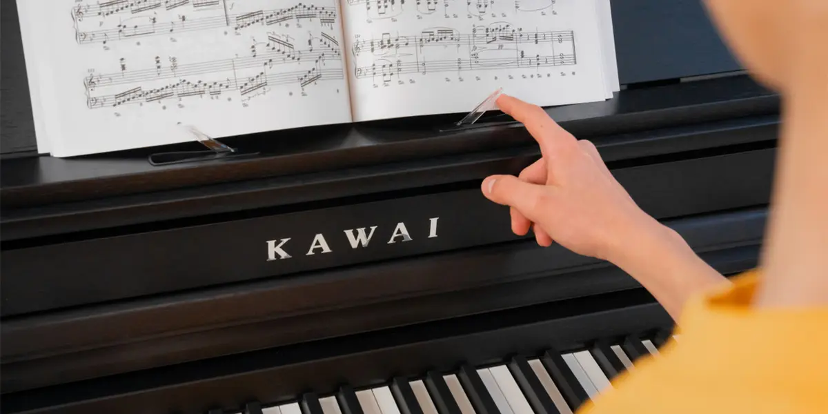 Kawai CA 401 sheet music shown on the digital piano