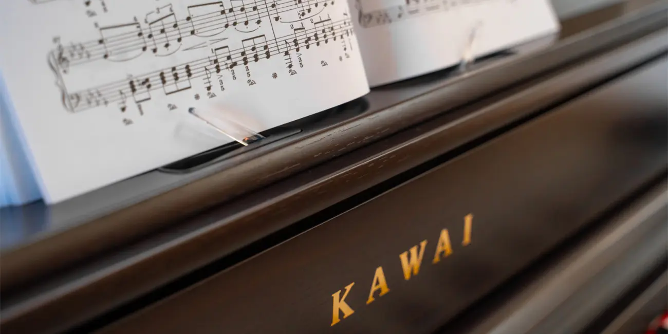 Kawai CA 701 logo and sheet music on the digital piano
