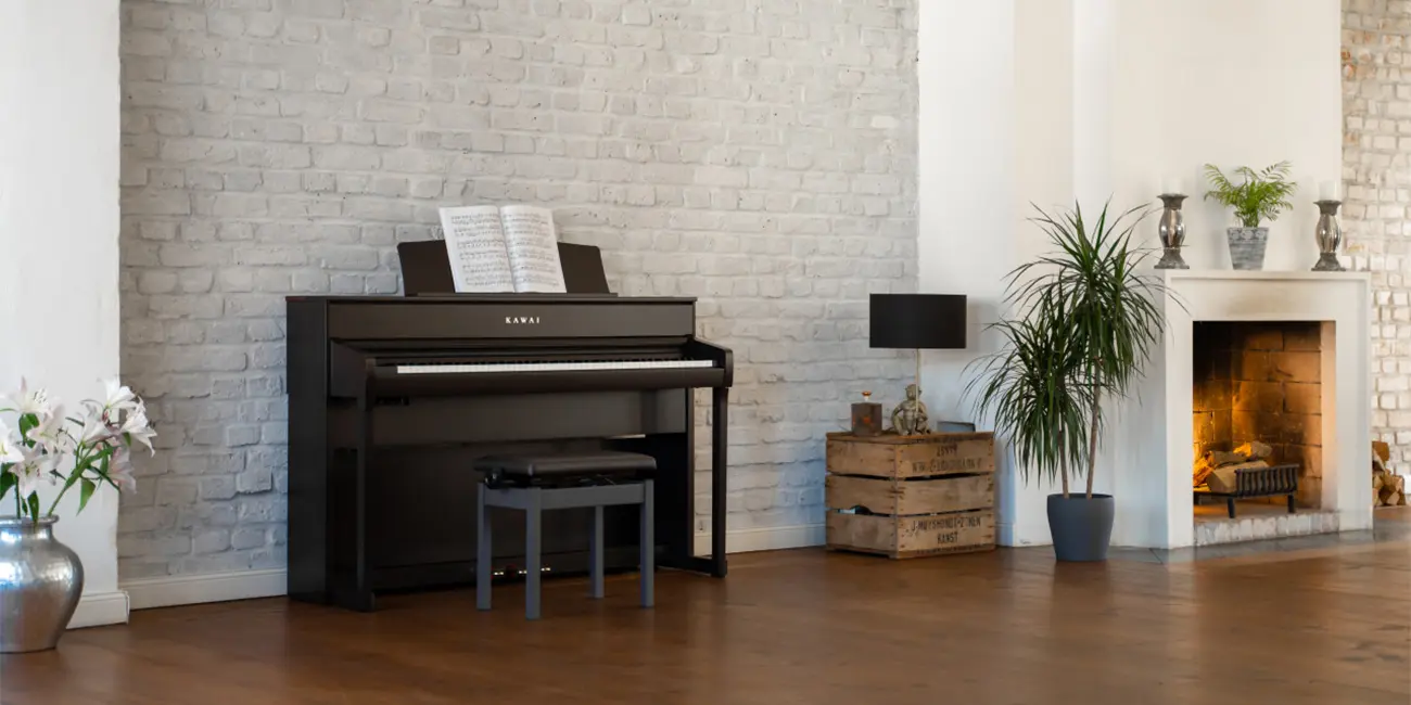 Kawai CA 701 digital piano with bench in the living room