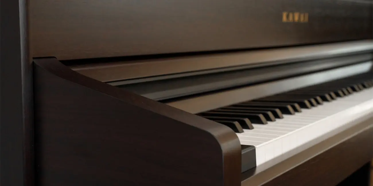 Kawai CA 701 keyboard in a dark wood finish