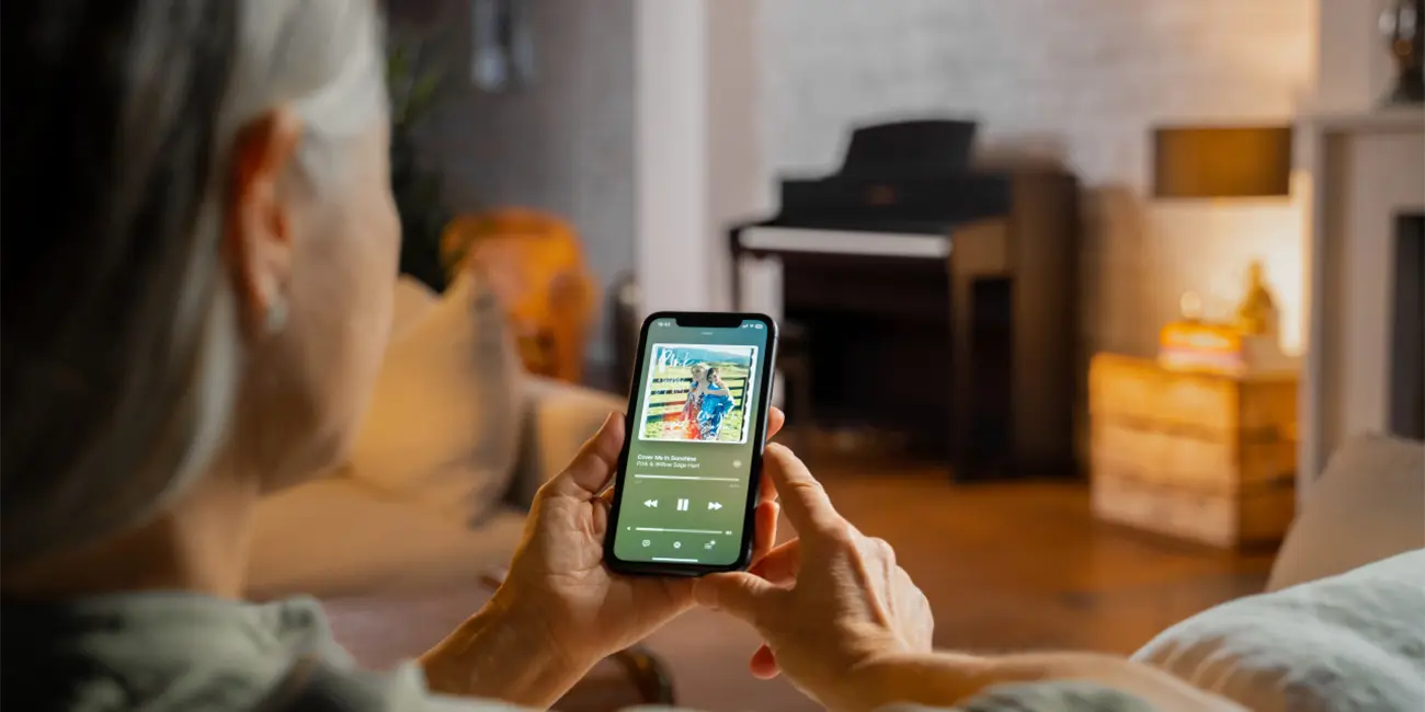 Kawai CA 701 smartphone app in a living room with digital piano