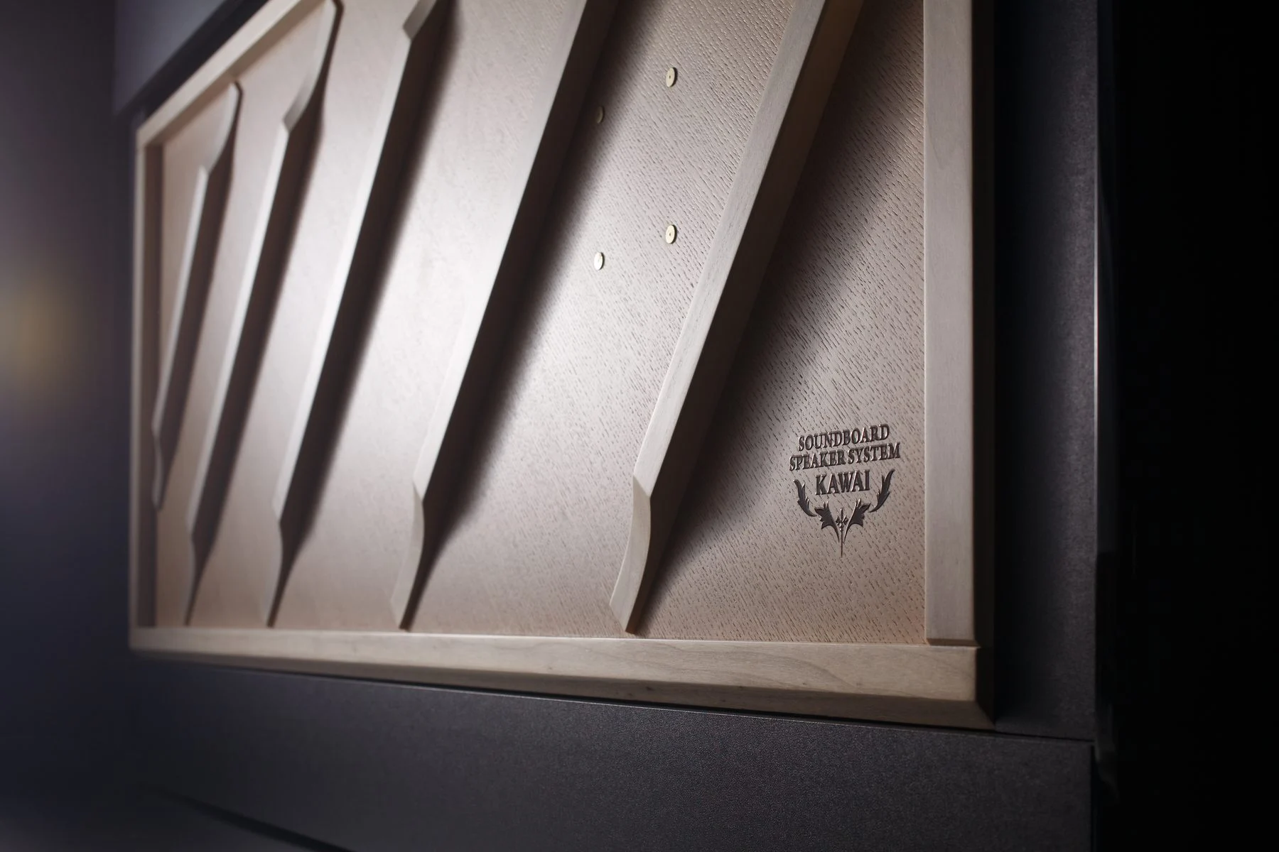 The wooden soundboard speaker system of the Kawai NOVUS NV6